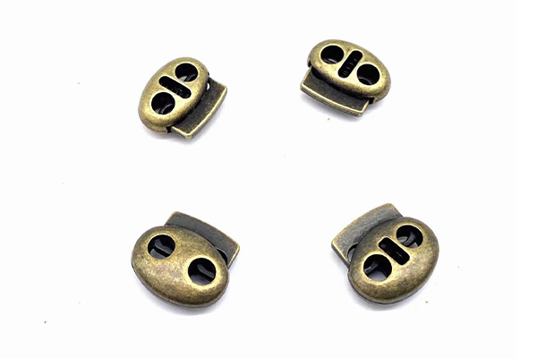 Two holes draw cord stopper